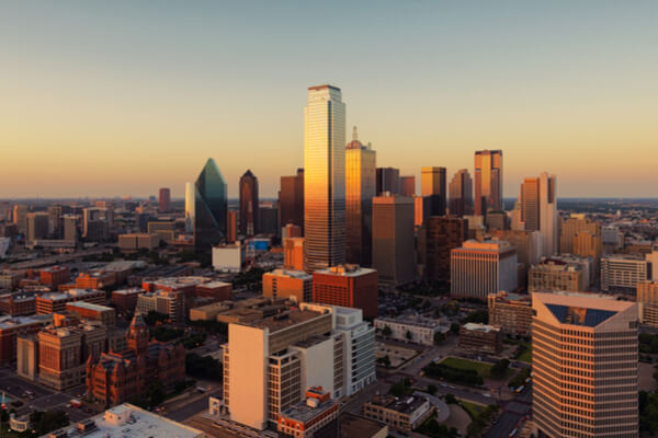 a view of the dallas city skyline at sunset